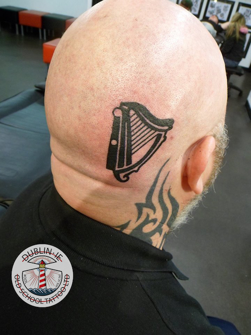 harp tattoo on head